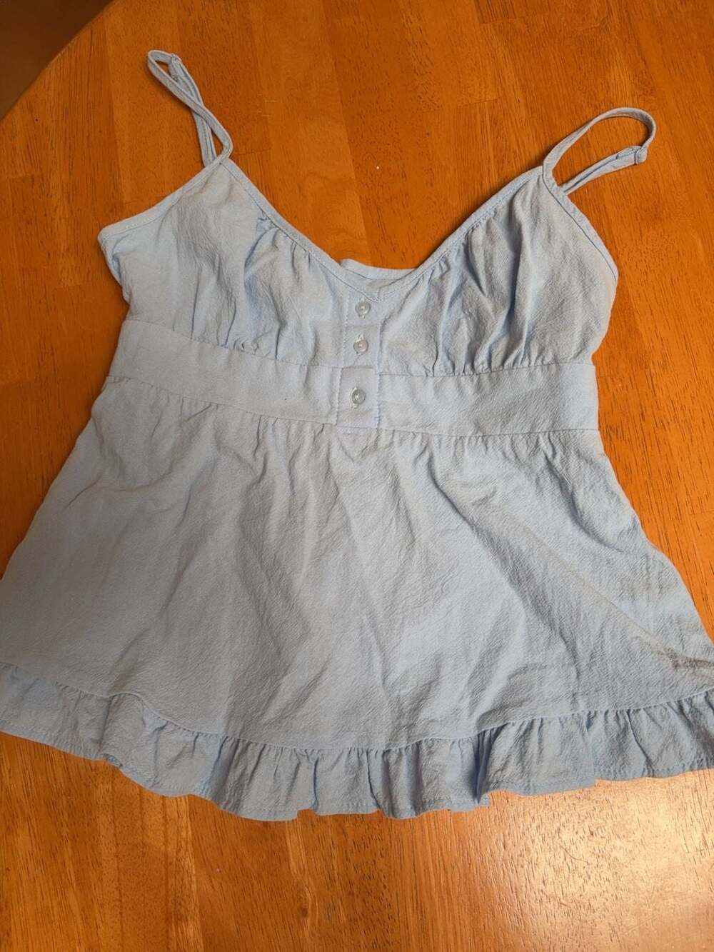 Babydoll top with ruffle.